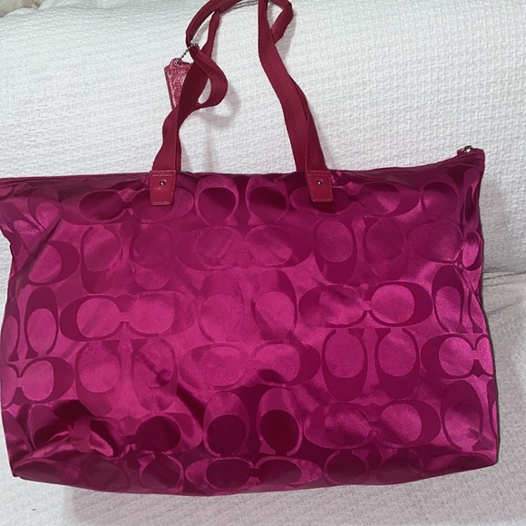 Like new Coach Getaway Signature Nylon Packable Weekender in Hot Pink - Picture 8 of 14